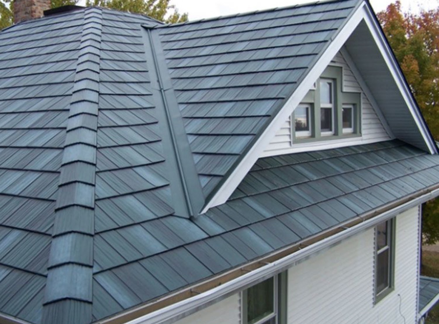 The History Of Metal And Composite Synthetic Roof Tiles