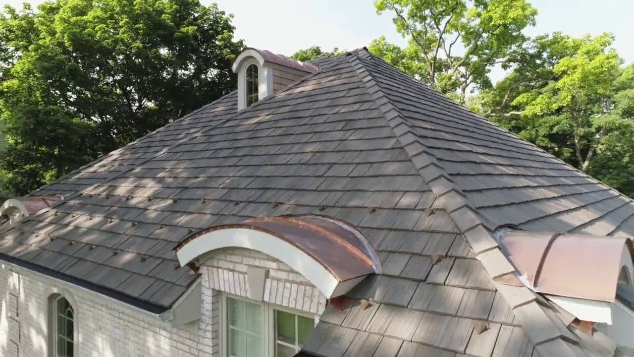 Colonial Lake House With Brown Roof Tiles