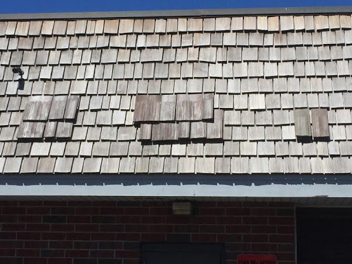 Pairing Synthetic Cedar Shakes with a Red-Brick Home